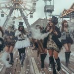 Atlantic City Ferrus wheel in Background. Diverse Women in top hats and Heels on the boardwalk in winter smoke weed, laugh and dance with each other and with men