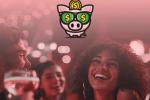 A group of people smiling and enjoying a party with drinks, with a cartoon piggy bank wearing dollar sign glasses and a coin on its head above them. The background is pink and festive.